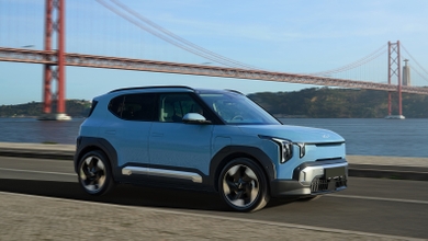 Kia EV2 driving in Lisbon