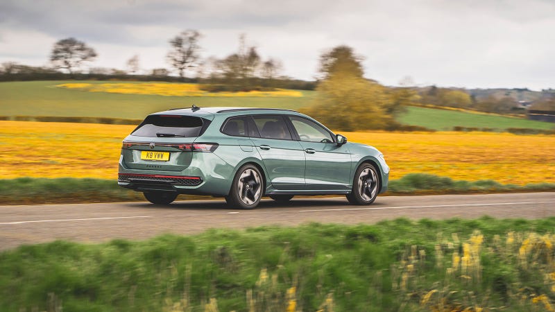 Volkswagen Passat eHybrid in green, rear three quarter