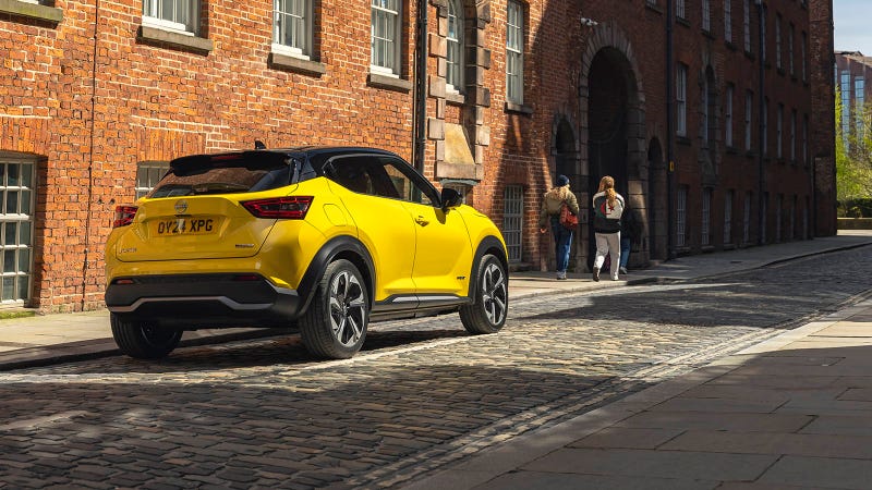 Nissan Juke in yellow, parked static rear three quarter