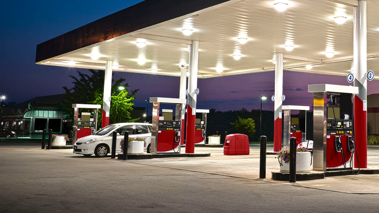 White car at a petrol station