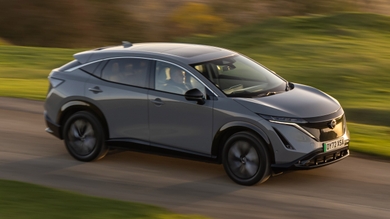 Nissan Ariya driving front/side view