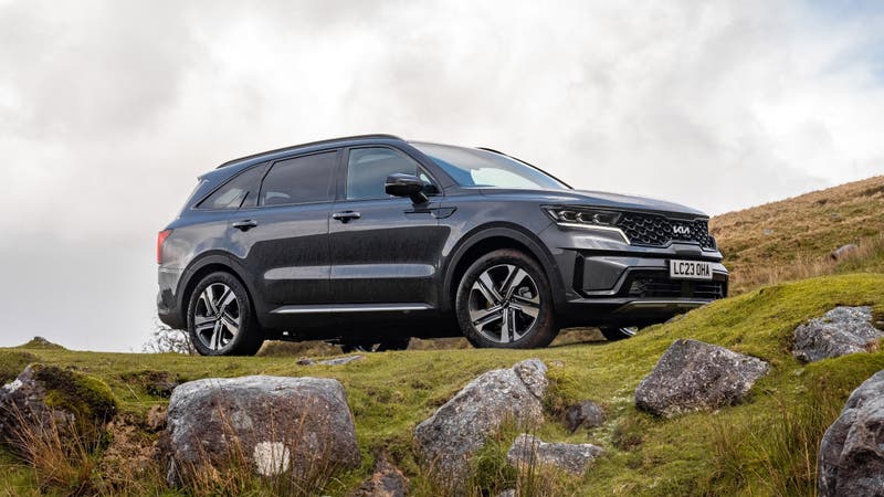 Kia Sorento HEV parked on rural hillside