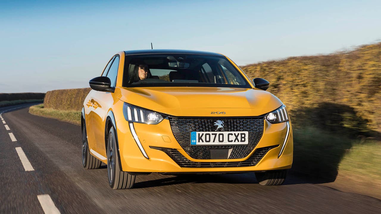 Peugeot 208 in yellow – driving shot