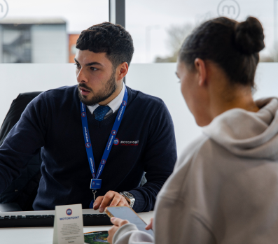 Motorpoint employee with customer