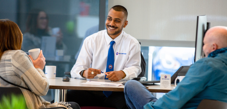 Motorpoint employee with 2 customers