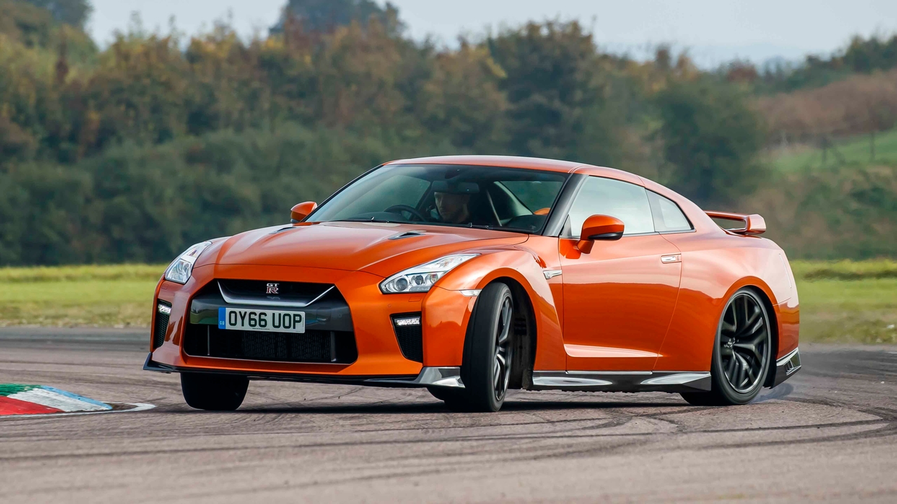 Nissan GT-R drifting on racetrack