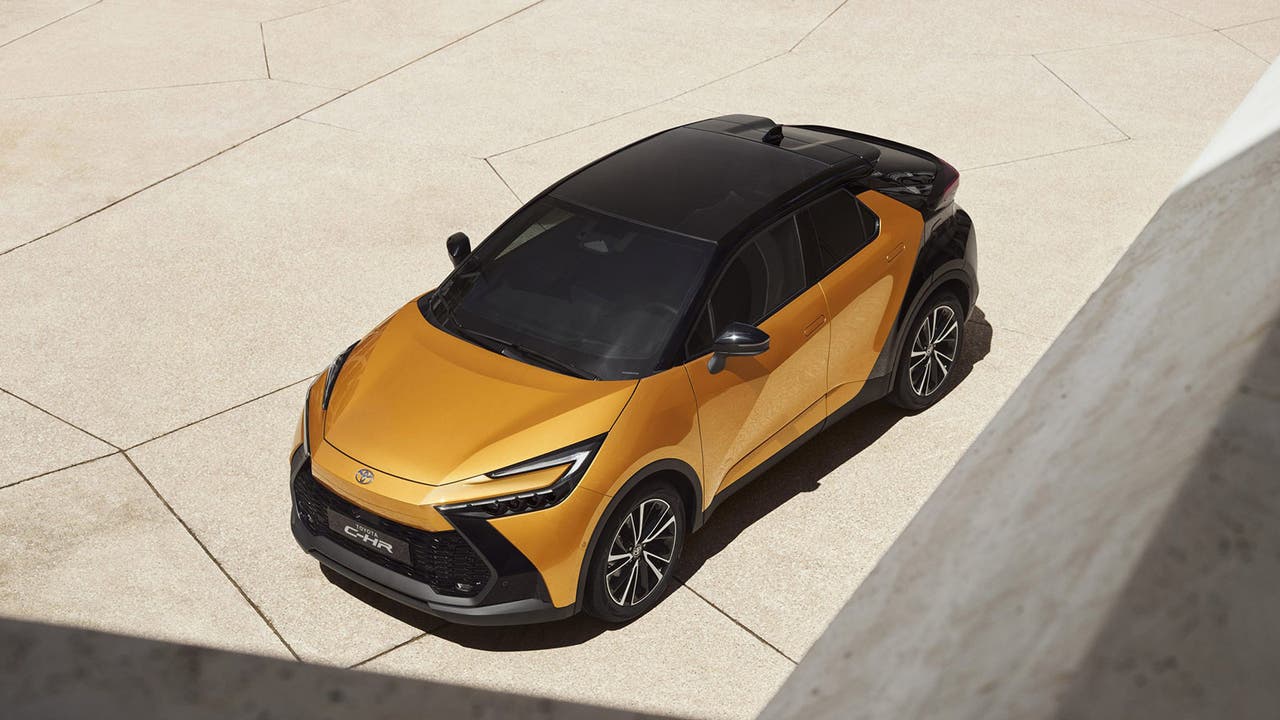 New Toyota C-HR in orange, high angle front three quarter shot