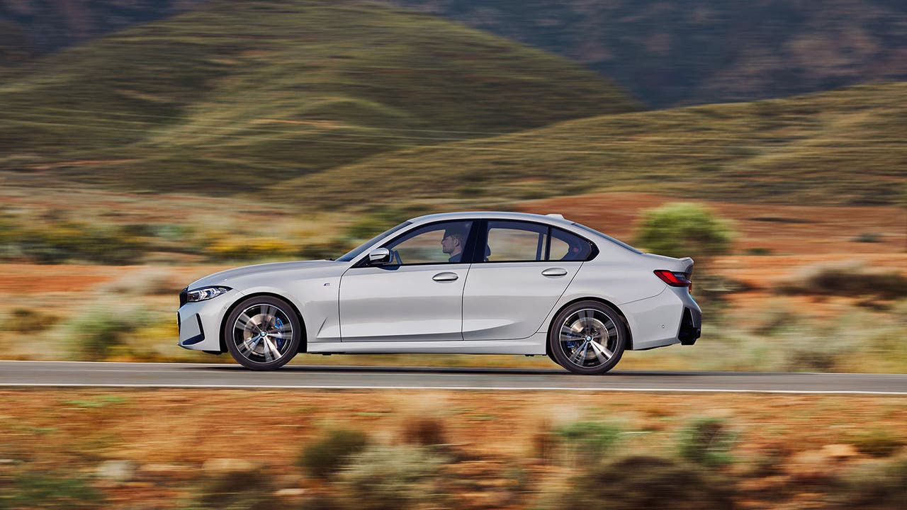 BMW 3 Series in grey, driving shot