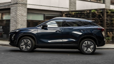 Omoda E5 driving side view