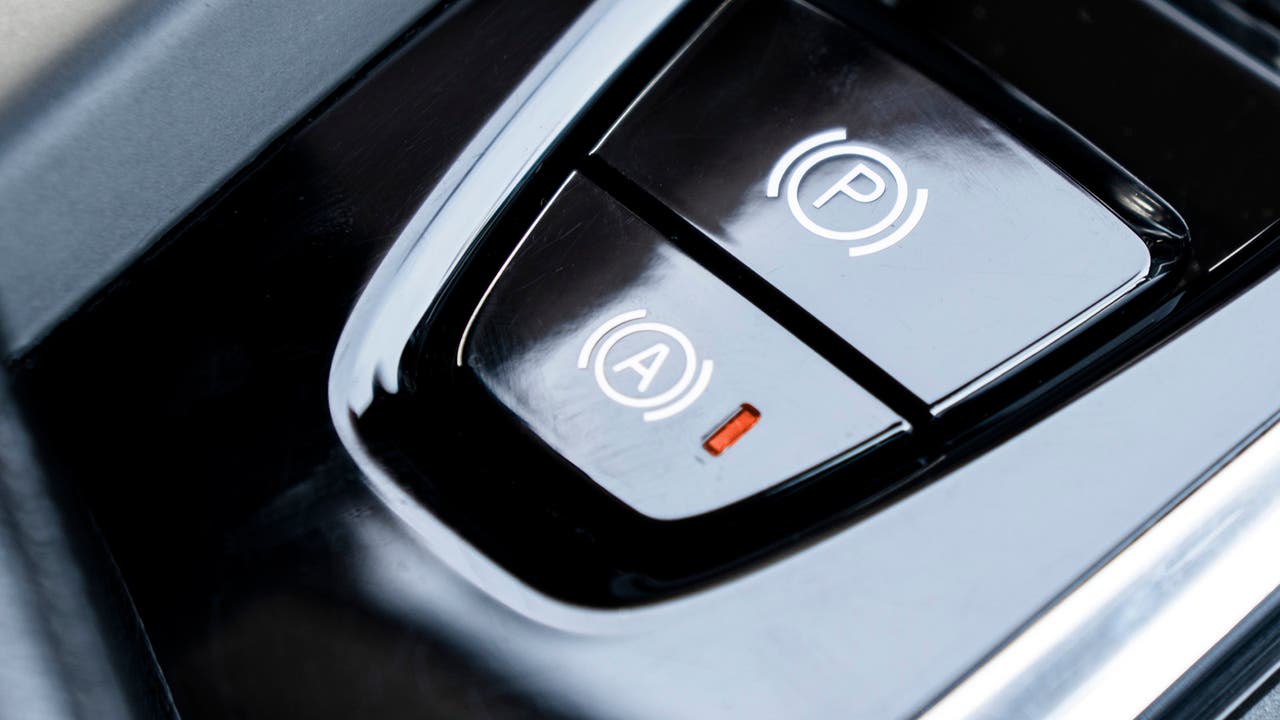 Auto-hold button illuminated